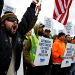 Dockworkers on East and Gulf Coast to return to work after reaching agreement on wages