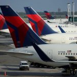 Delta forecasts fourth-quarter revenue below estimates, shares fall