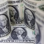 Dollar bulls suffer setback as traders add to Fed cut bets