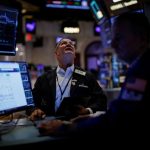 Chip stock rally, upbeat retail sales data boost indexes