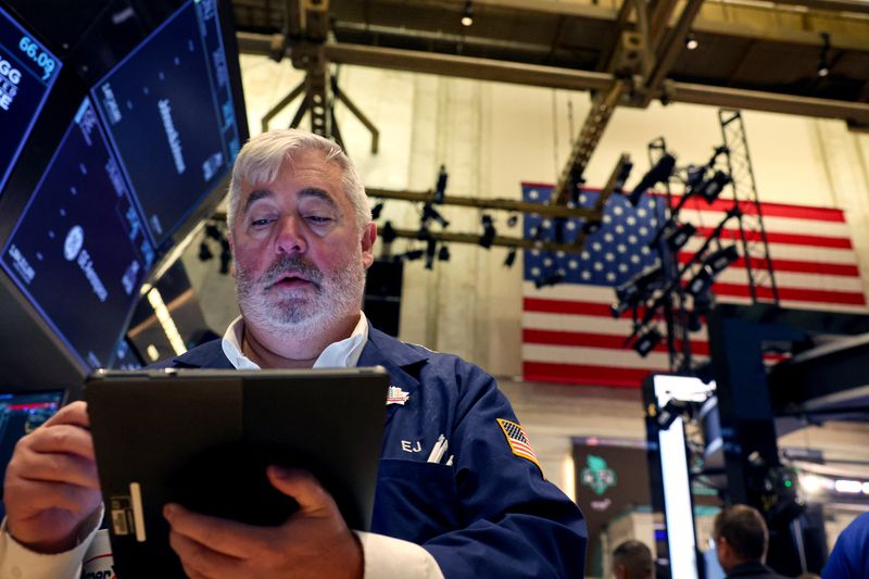 Wall St rallies on election day as investors await outcome