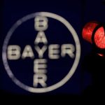 Bayer cuts FY operating earnings outlook on weak agriculture markets