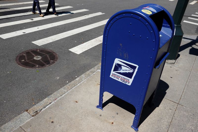 US Postal Service warns it must continue cost cuts or remains on path to possible bailout