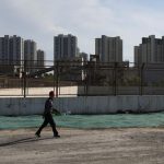 China new home prices fall 0.5% m/m in October