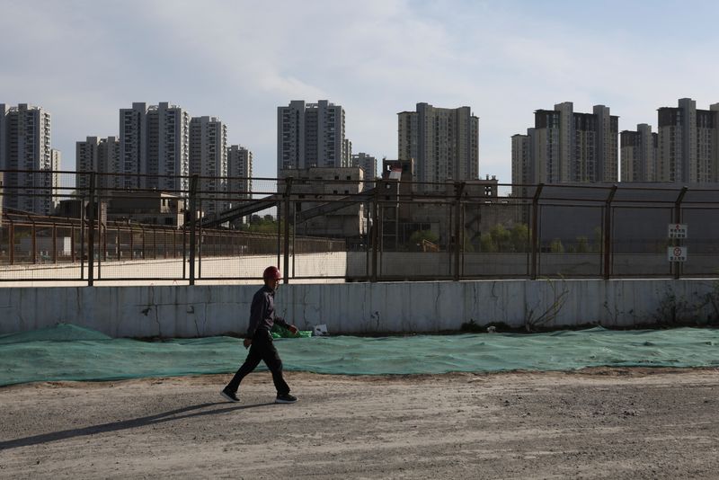 China new home prices fall 0.5% m/m in October