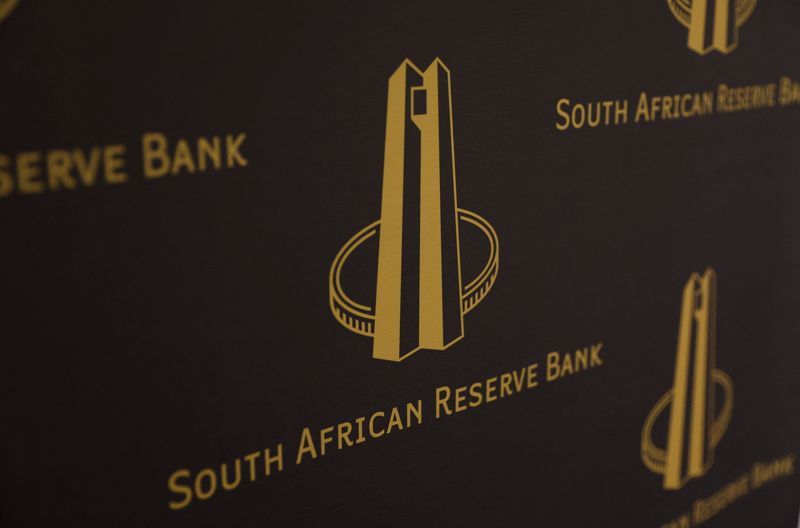 South African central bank trims key rate but stresses tough backdrop