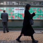 Asian shares slip, yen aims for best week in 4 months on BOJ hike bets