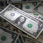 Dollar holds ground ahead of CPI, Aussie wallows near 4-month low