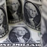 Dollar hovers near 3-week high before Fed; bitcoin tops $105,000