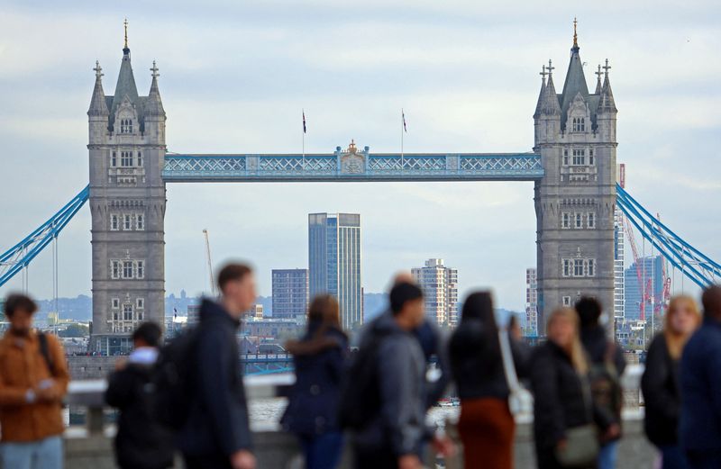 UK pay rises by more than expected, adding to worries for Bank of England