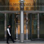 Hong Kong central bank cuts interest rate, tracking Fed move