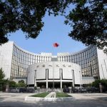 China leaves benchmark lending rates unchanged in Dec