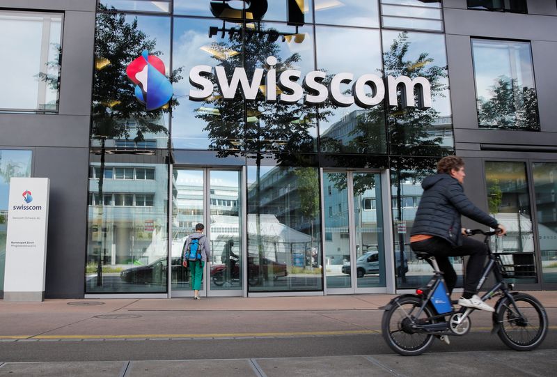 Swisscom revises down earnings outlook after Vodafone Italia acquisition complete