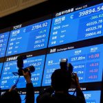 Asia shares wary, dollar upbeat before data deluge