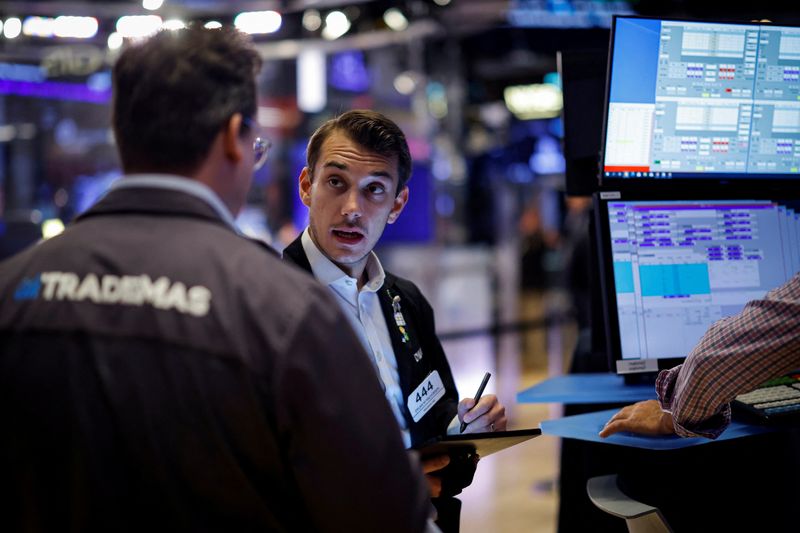 Futures drop on caution ahead of key payrolls data