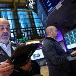 Wall St slips as focus shifts to earnings, consumer inflation data