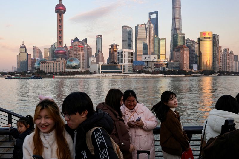 China’s economy meets official growth target, but many feel worse off