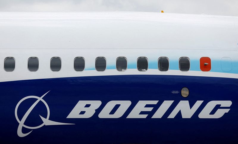 Boeing forecasts bigger-than-expected quarterly loss on defense troubles, strike hit